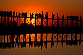 Myanmar - Amarapura, sunset at the U Bein Bridge, the longest teak bridge in the world.